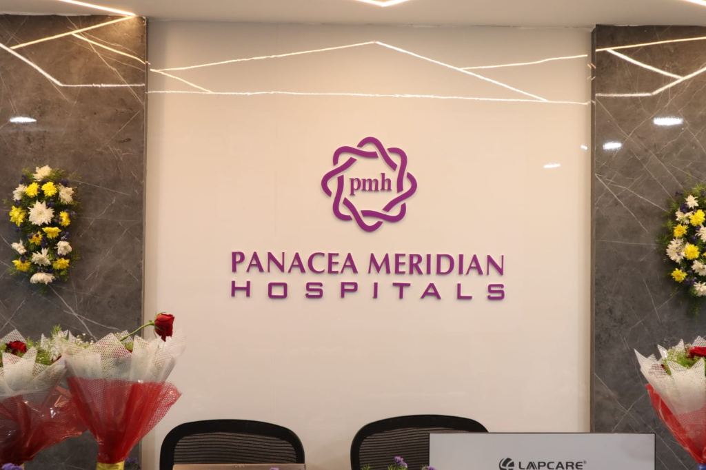 Panacea Meridian Hospitals Reception Wall Branding